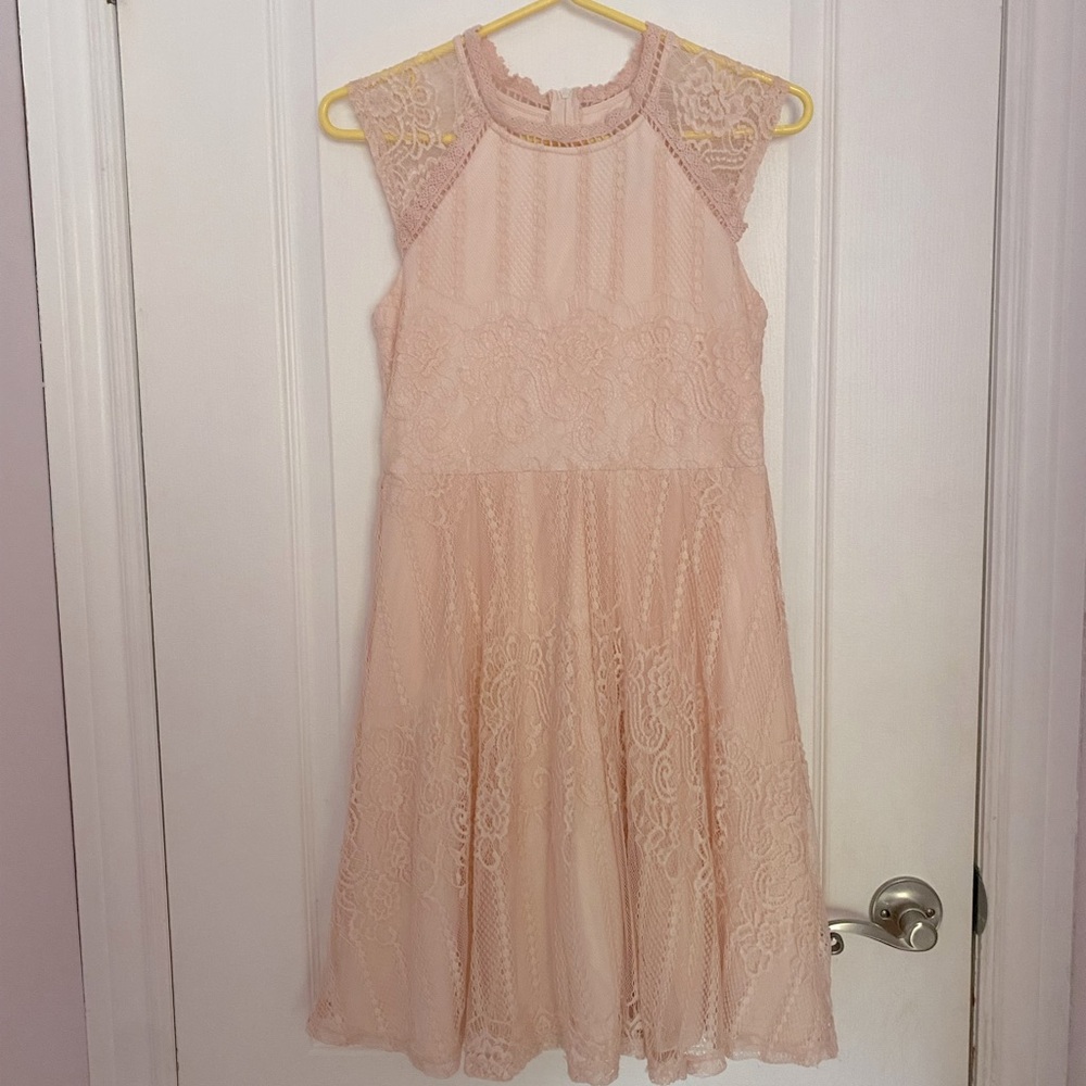 Girls size 16 formal dress in the colour light pink.